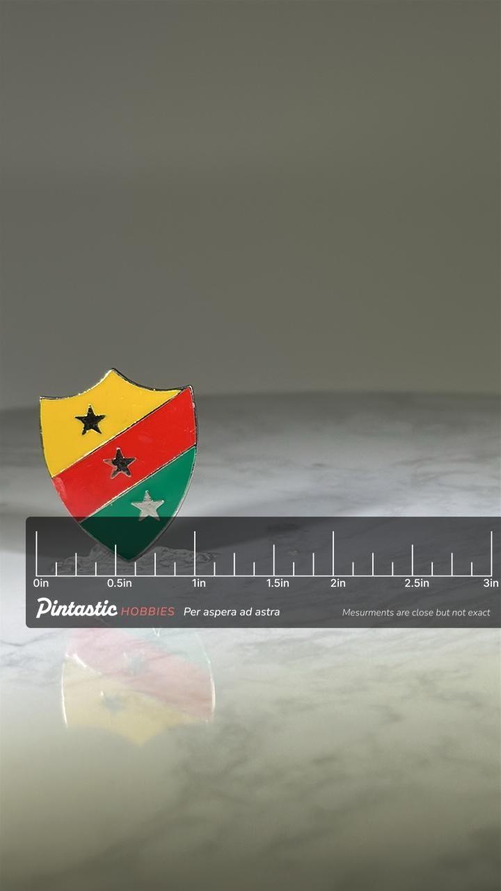Sao Tome and Principe Shield Pin: Shield Enamel Emblem - Vintage Patriotic Accessory with ruler overlay for size reference