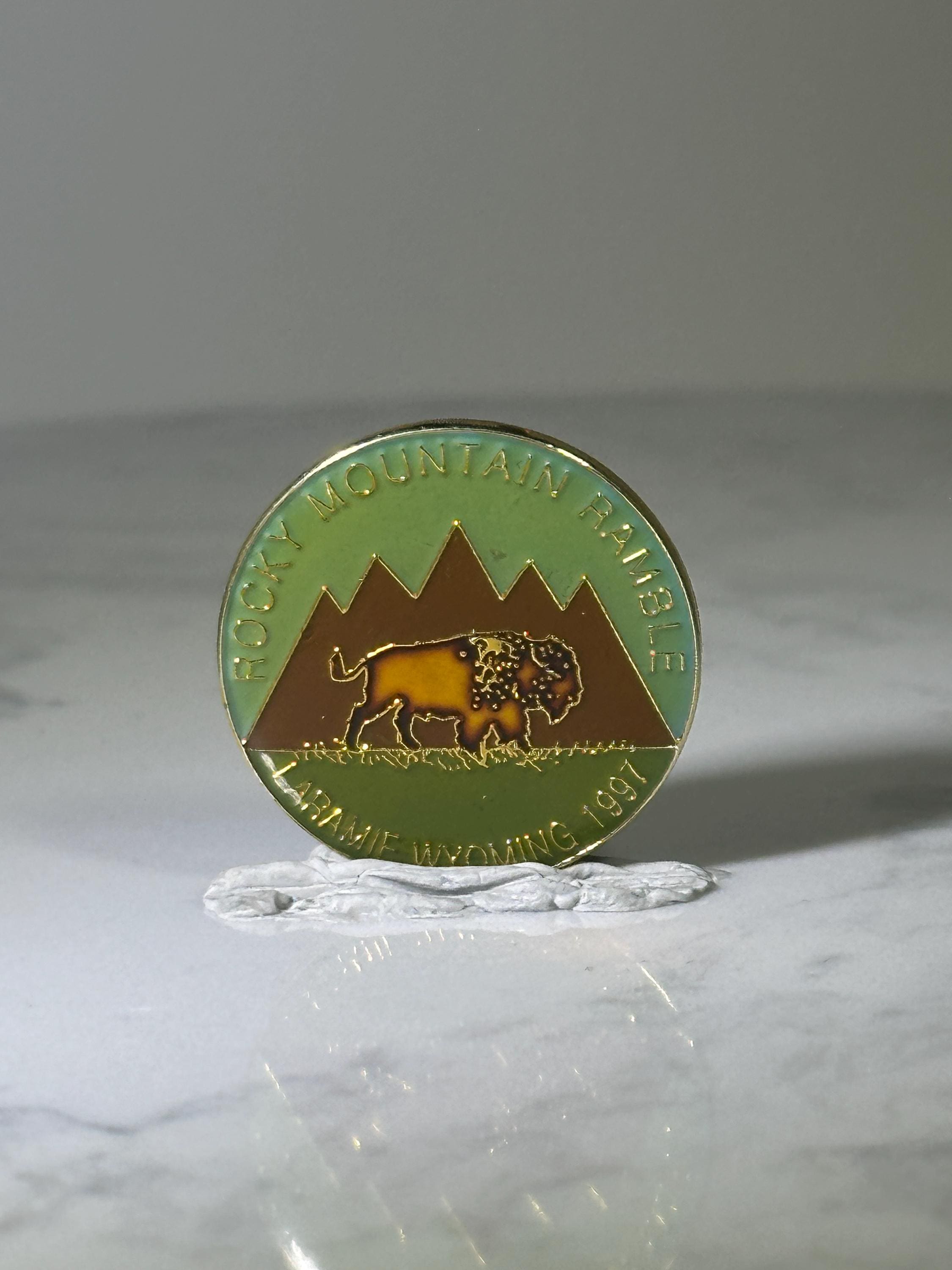 Rocky Mountain Ramble Pin: Green & Brown Enamel - 1997 Laramie Souvenir