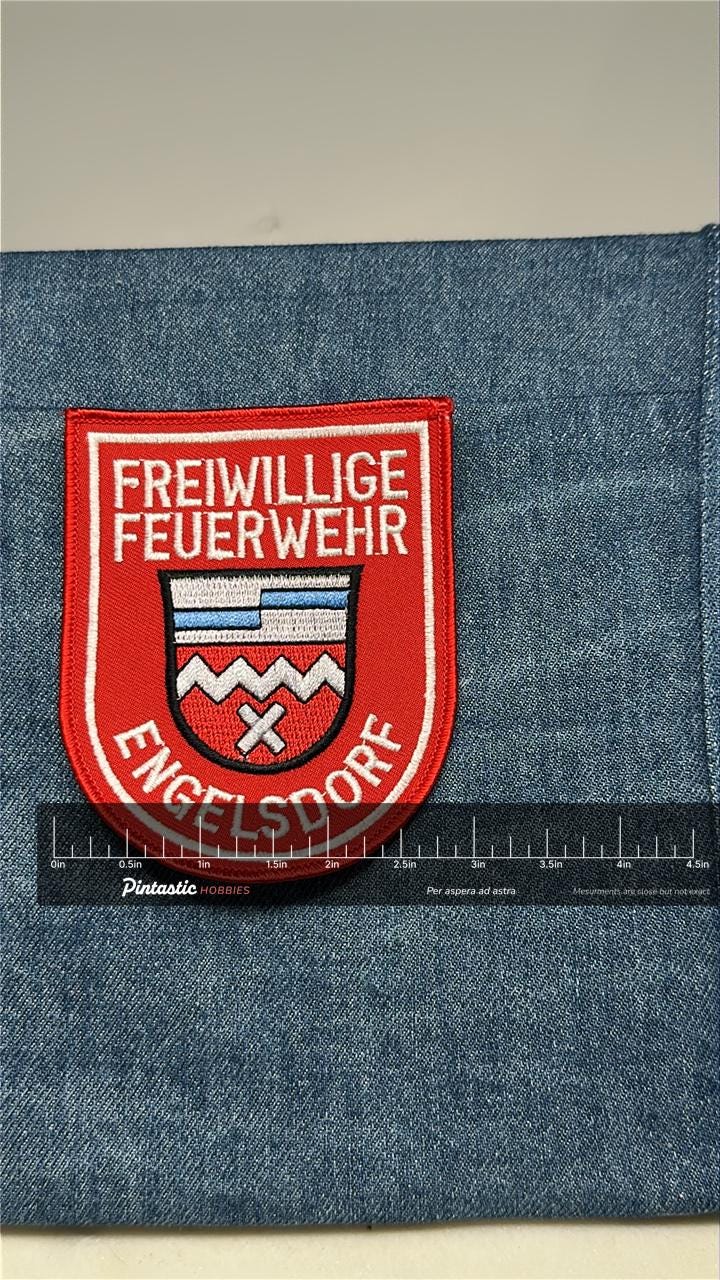 Engelsdorf Fire Department Collectable Patch: Sew-On Red Shield - German Civic Accessory with ruler overlay for size referenc