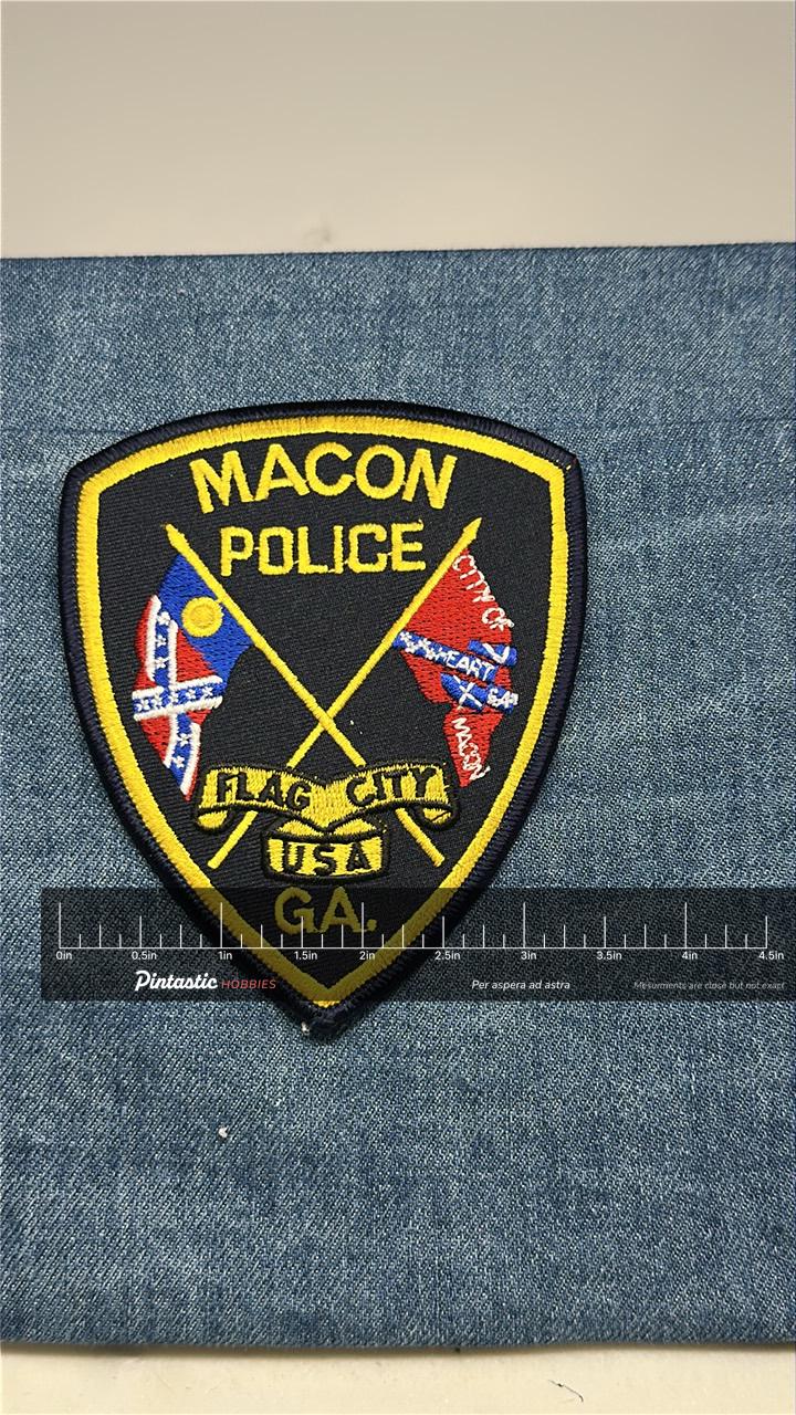 Macon Police Collectable Patch: Iron-On Black/Yellow Shield - Vintage Accessory with ruler overlay for size reference