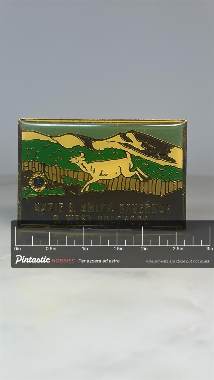 Lions Club Moose Pin: Gold Enamel - West Colorado Governor Souvenir with ruler overlay for size reference