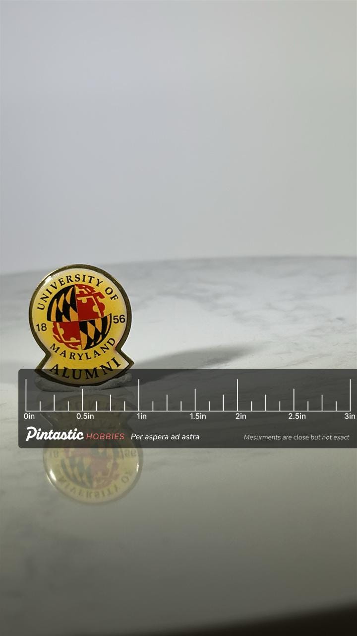 University of Maryland Alumni Pin: Red & Gold Enamel - College Pride Accessory with ruler overlay for size reference