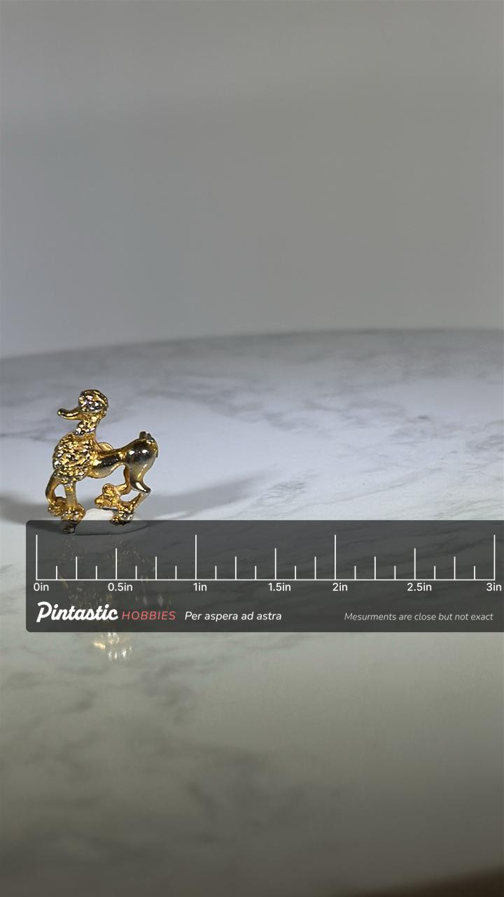Poodle Dog Lapel Pin: Gold Tone Textured - Mid-Century Animal Accessory with ruler overlay for size reference