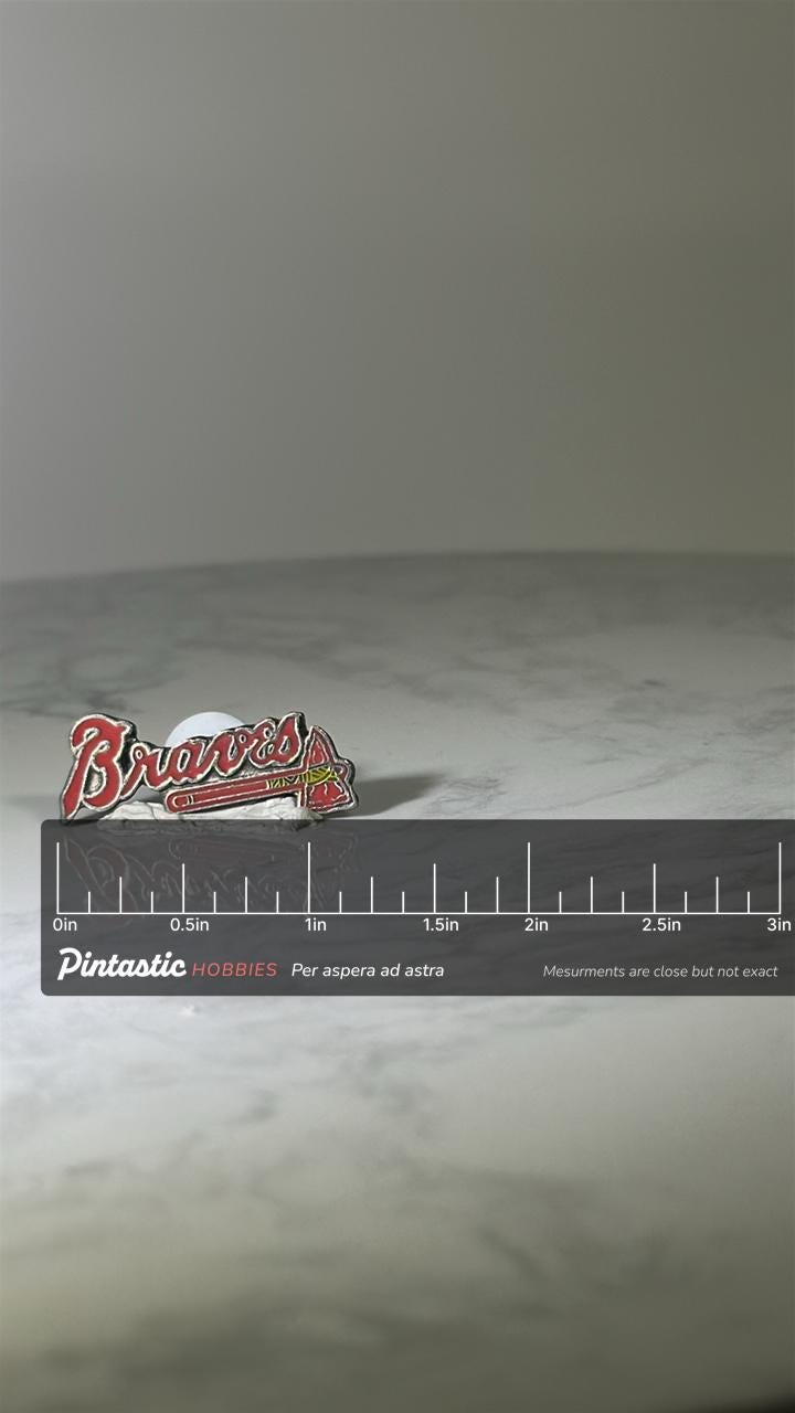 Braves Baseball Pin: Red Enamel Metal - Vintage Sports Accessory with ruler overlay for size reference