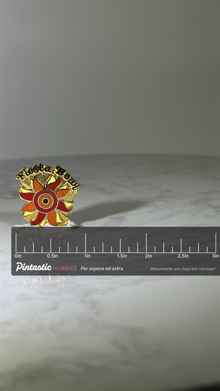 Fiesta Bowl Collector Pin: Gold Enamel Sunburst - Vintage Sports Accessory with ruler overlay for size reference