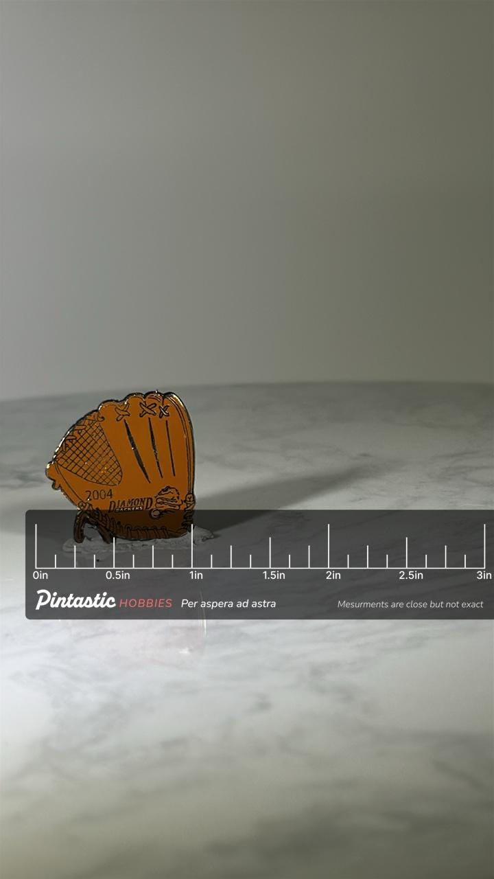 Baseball Glove Pin: Tan Enamel Finish - 2004 Sports Accessory with ruler overlay for size reference