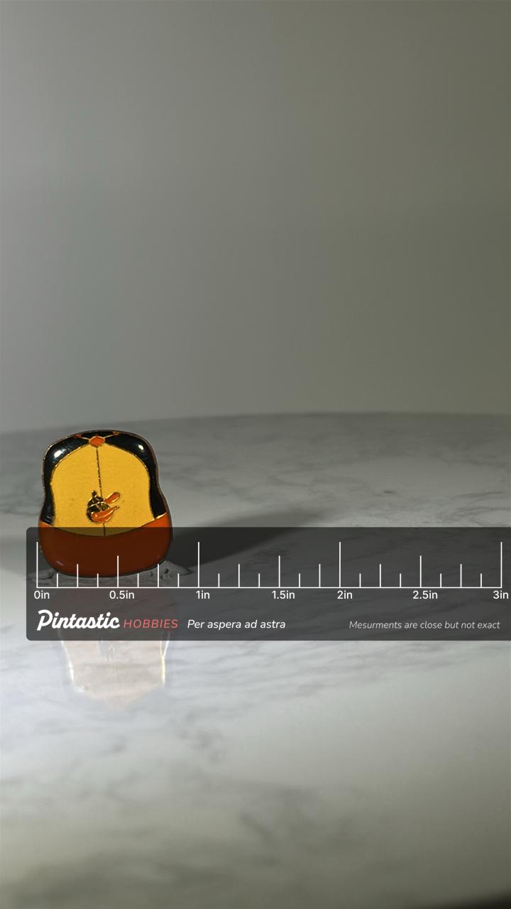 Baltimore Orioles Enamel Pin: Yellow Orange Black - Retro MLB Accessory with ruler overlay for size reference