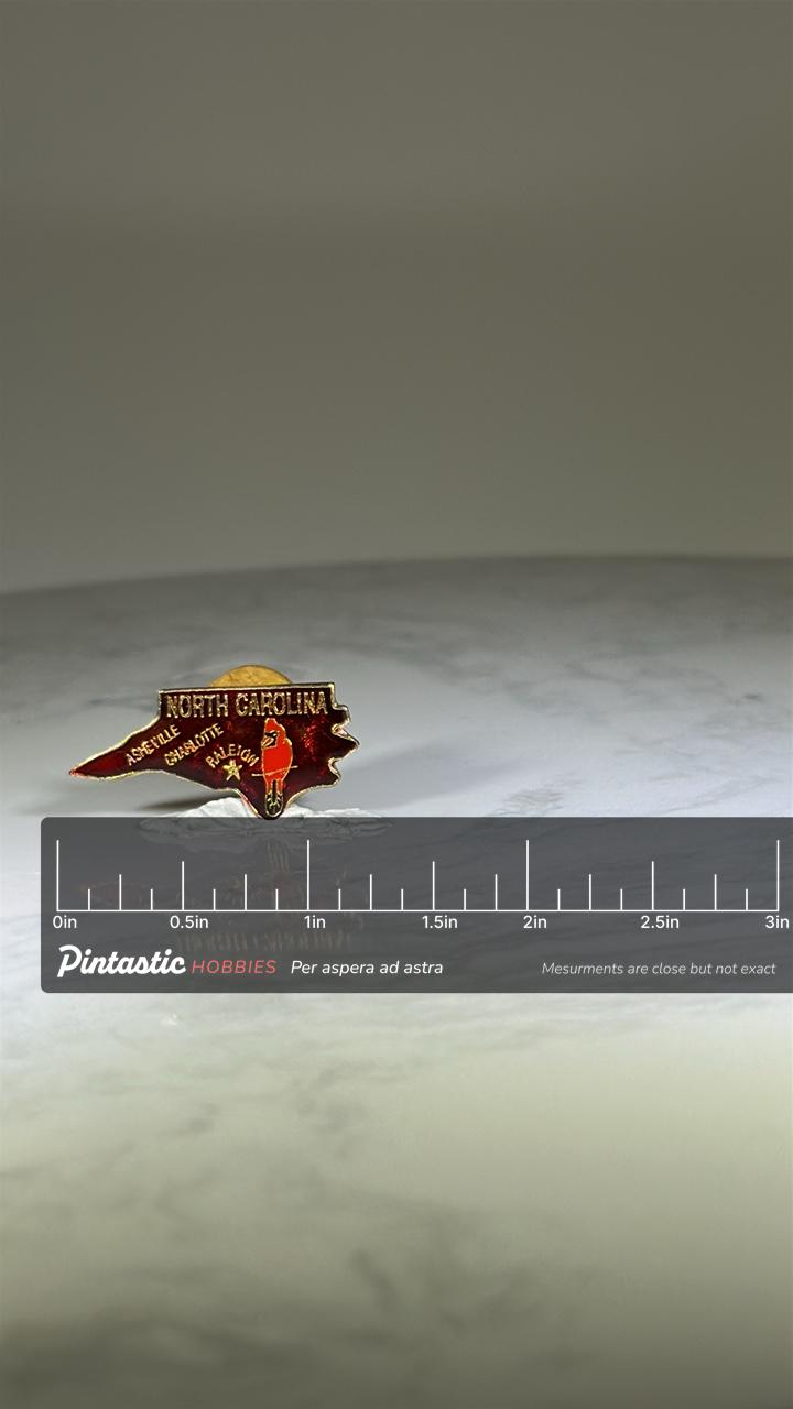 North Carolina State Souvenir Pin: Red Enamel Gold Trim - Vintage Travel Accessory with ruler overlay for size reference