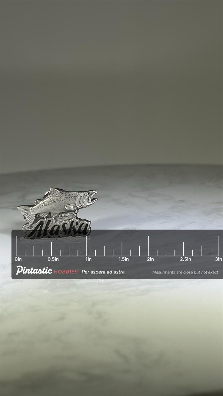Alaska Jumping Salmon Pin: Pewter Finish - Travel Souvenir Accessory with ruler overlay for size reference