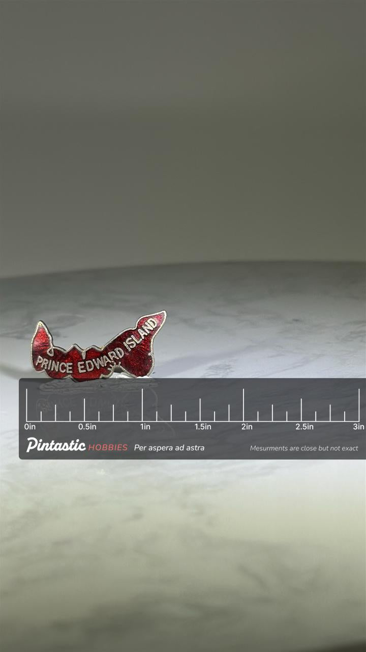Prince Edward Island Pin: Red Enamel Map - Vintage Travel Souvenir Accessory with ruler overlay for size reference
