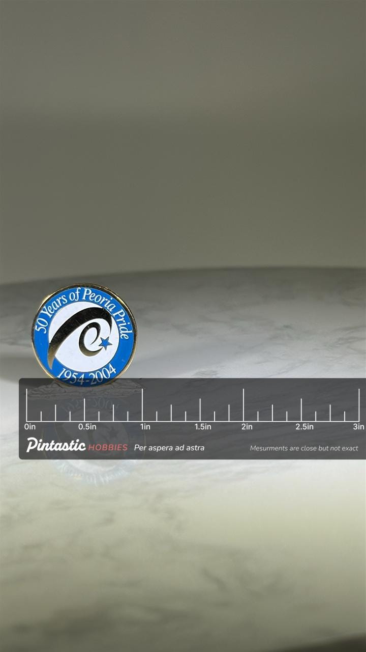 Peoria Pride Commemorative Pin: Blue Enamel Round - 2004 Anniversary Accessory with ruler overlay for size reference