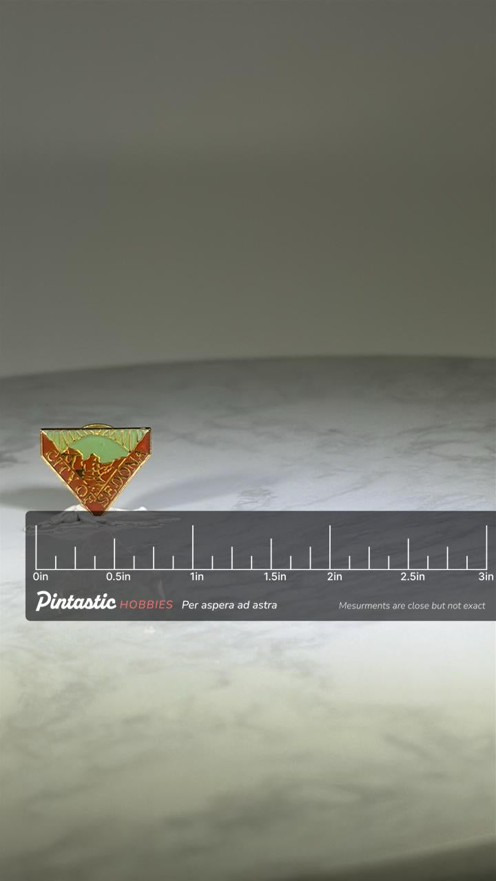 City of Sedona Souvenir Pin: Red & Green Enamel - Vintage Travel Accessory with ruler overlay for size reference