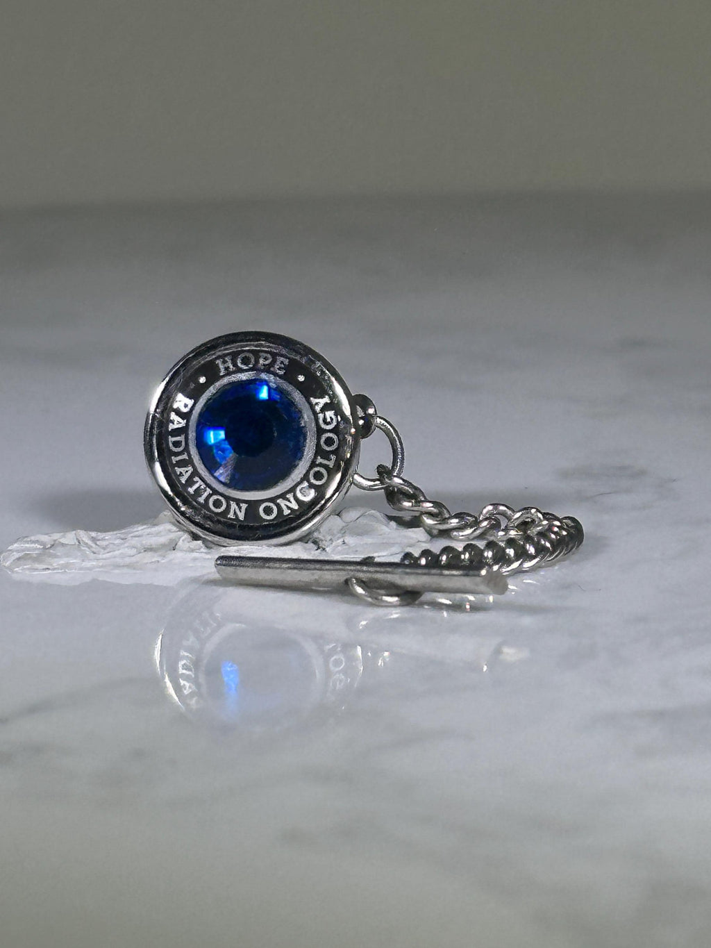 Radiation Oncology Tie Tack: Silver & Blue Gem - Medical Hope Accessory