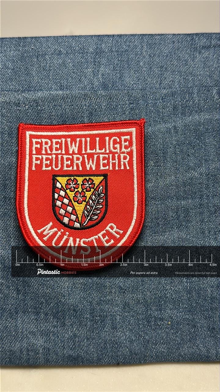 Münster Fire Department Collectable Sew-On Patch: Red Colored - German Civic Accessory with ruler overlay for size reference