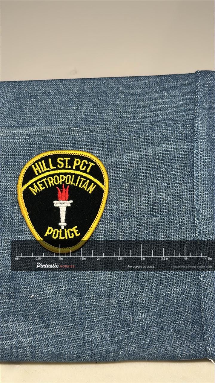 Hill St. Pct Police Collectable Patch: Iron-On Black/Yellow - TV Era Accessory with ruler overlay for size reference