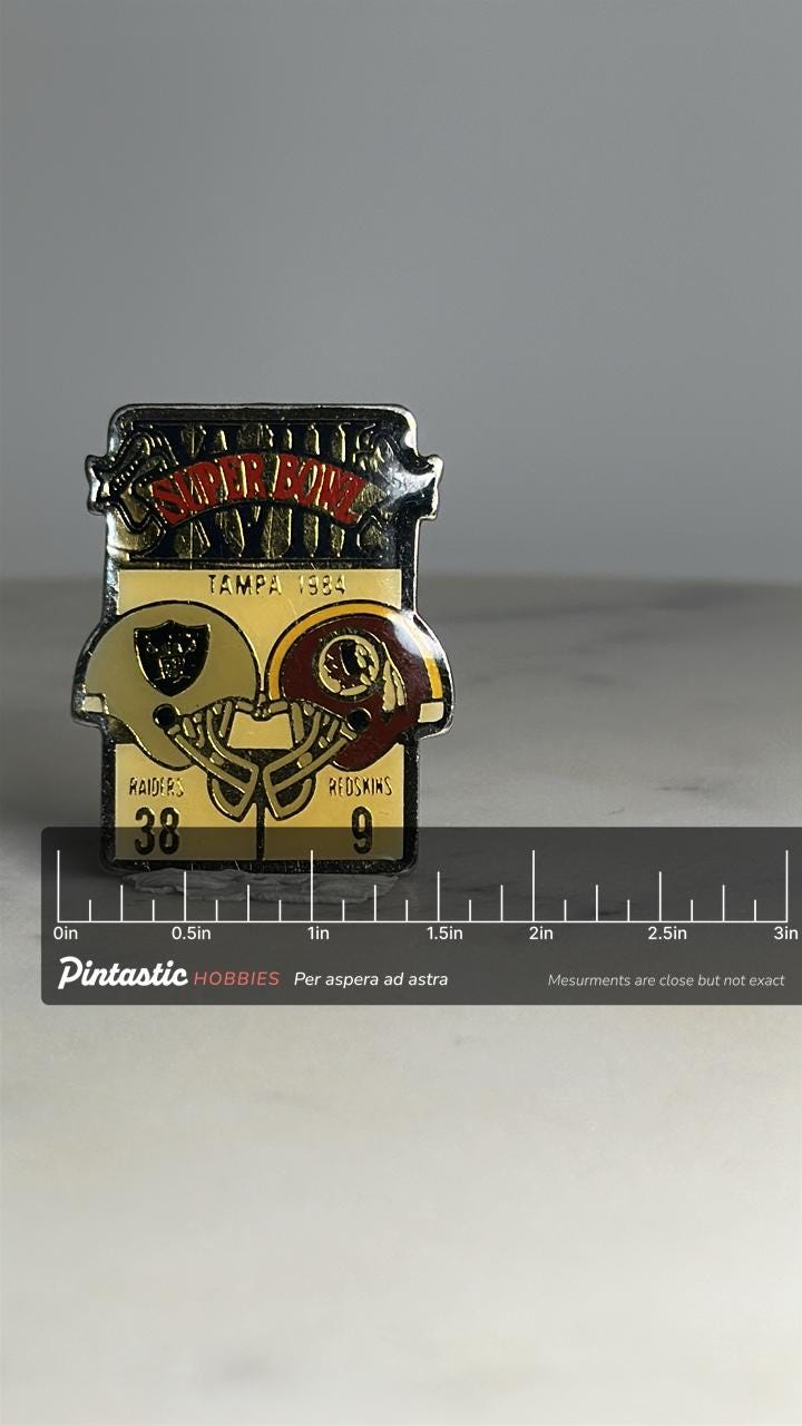 Super Bowl XVIII Collector Pin: Enamel Metal Finish - 1984 Sports Accessory with ruler overlay for size reference