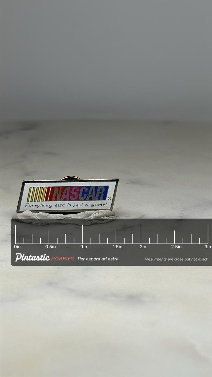 NASCAR Racing Pin: Retro Logo Enamel - Vintage Sports Accessory with ruler overlay for size reference