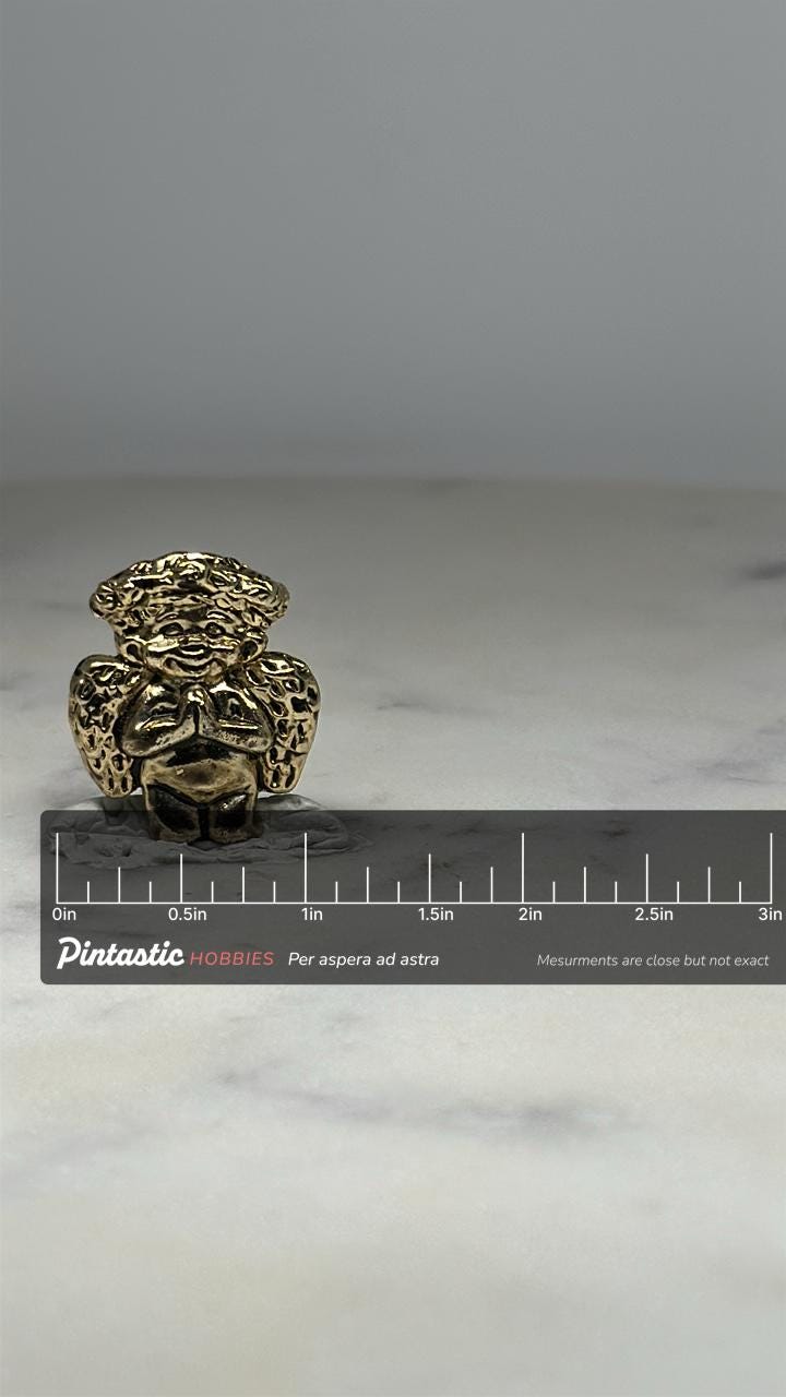 Praying Angel Lapel Pin: Gold-Tone Metal - Vintage Religious Accessory with ruler overlay for size reference