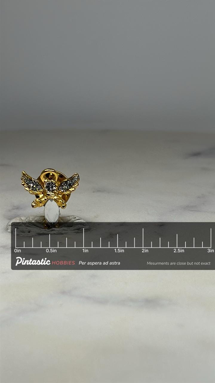 Angel Rhinestone Pin: Gold Tone with Clear Crystals - Vintage Holiday Accessory with ruler overlay for size reference