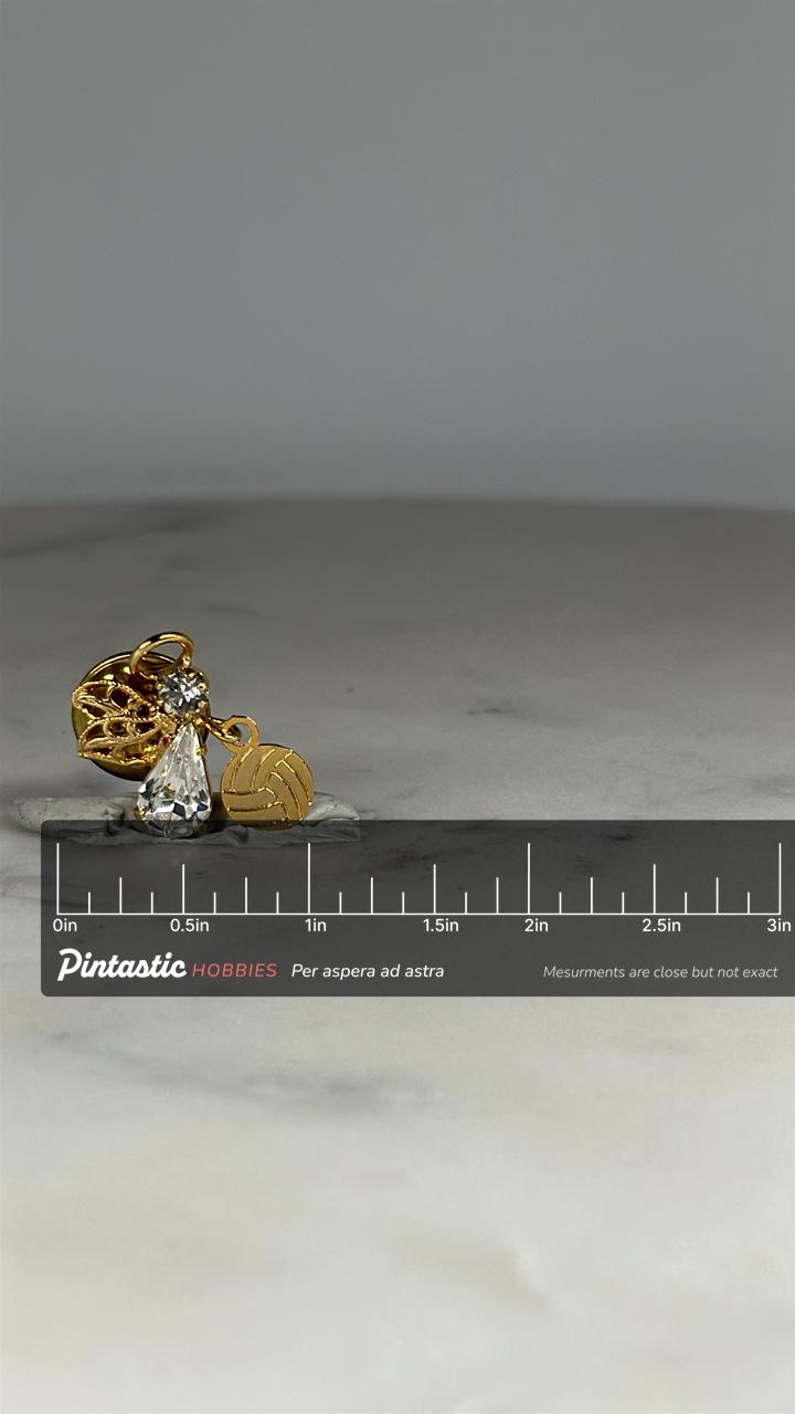 Angel Volleyball Charm Pin: Gold Tone with Rhinestone Drop - Vintage Accessory with ruler overlay for size reference