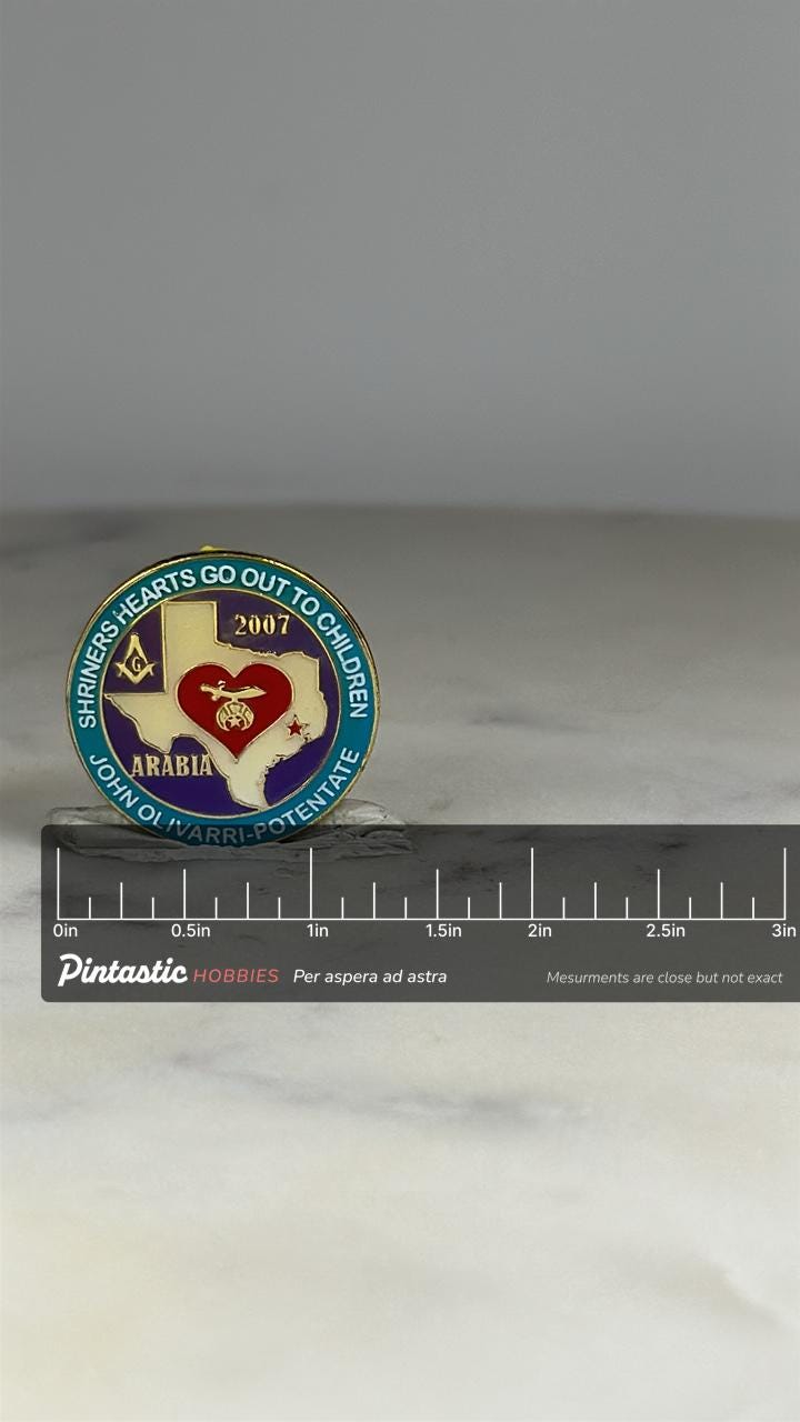 Shriners Children's Charity Pin: Gold Red Enamel - 2007 Texas Accessory with ruler overlay for size reference