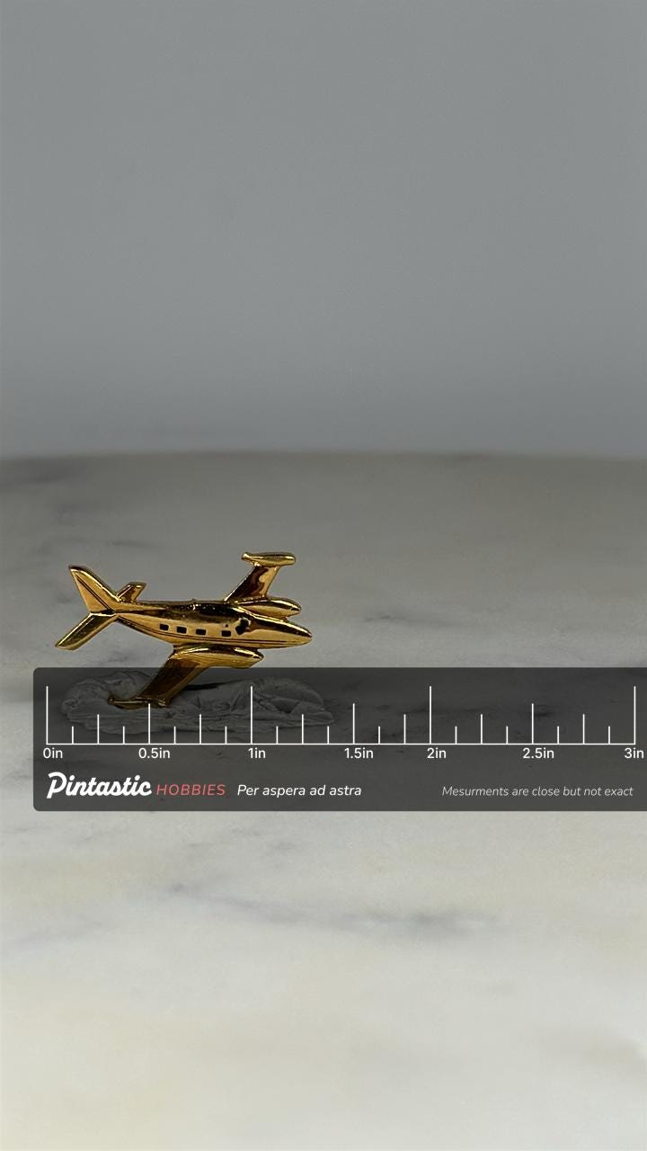 Jet Airplane Lapel Pin: Gold Tone - Vintage Aviation Accessory with ruler overlay for size reference