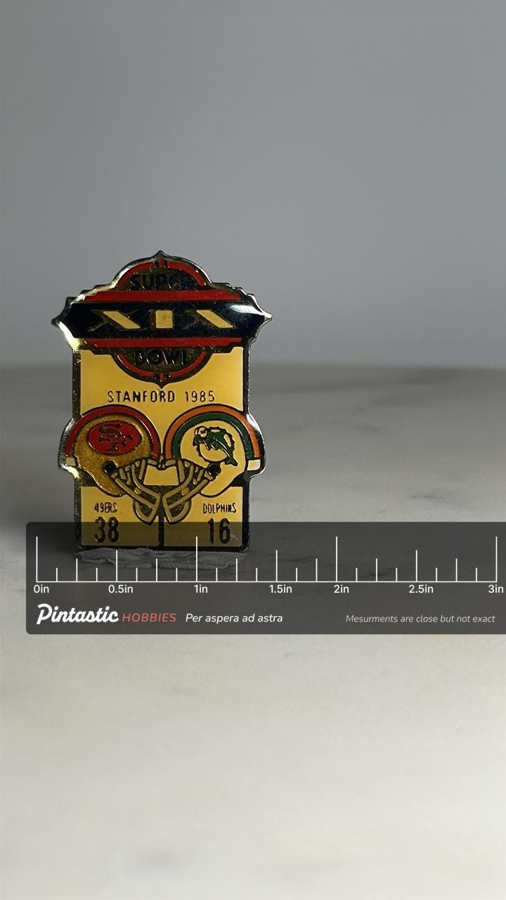 Super bowl xix pin: gold enamel football design - 1985 sports accessory with ruler overlay for size reference