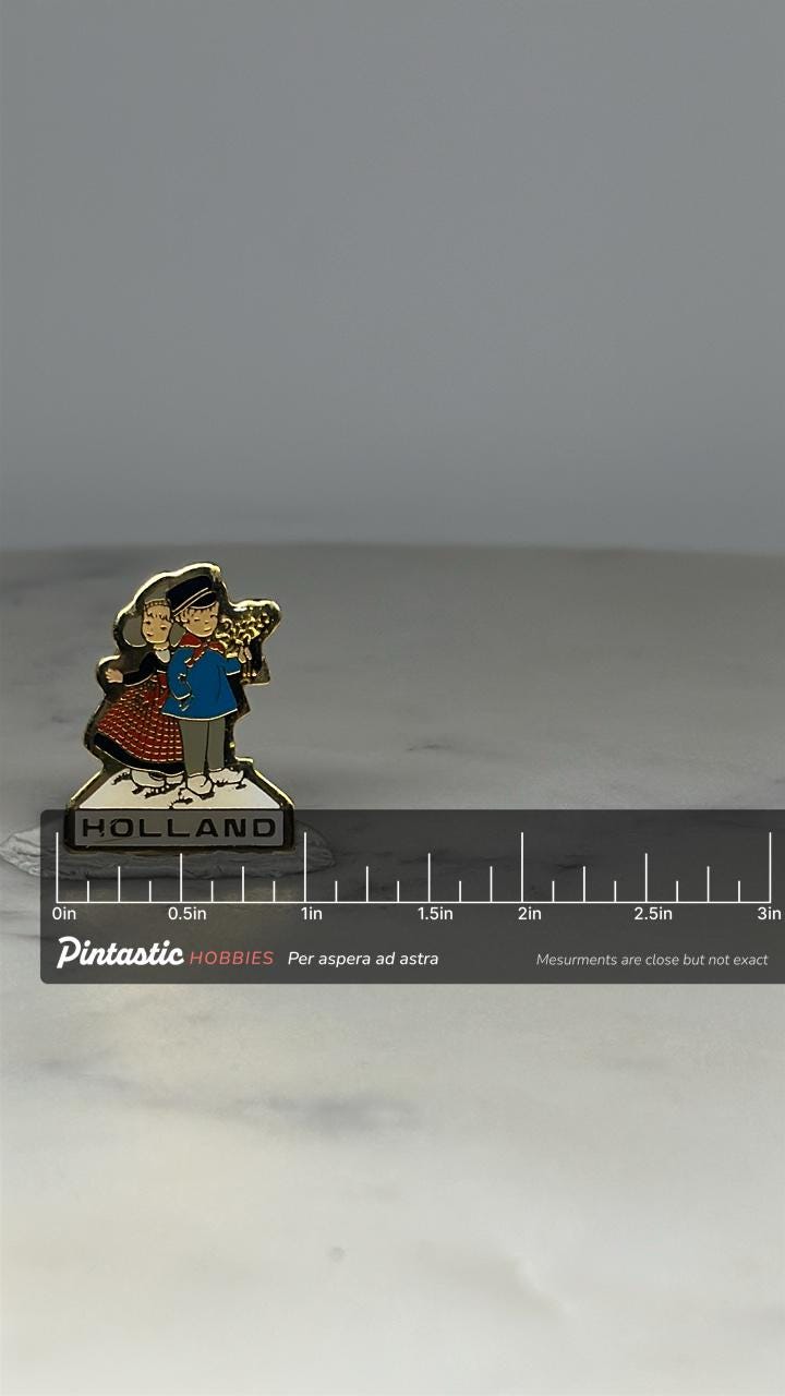 Holland Souvenir Pin: Enamel Finish - Vintage Travel Accessory with ruler overlay for size reference
