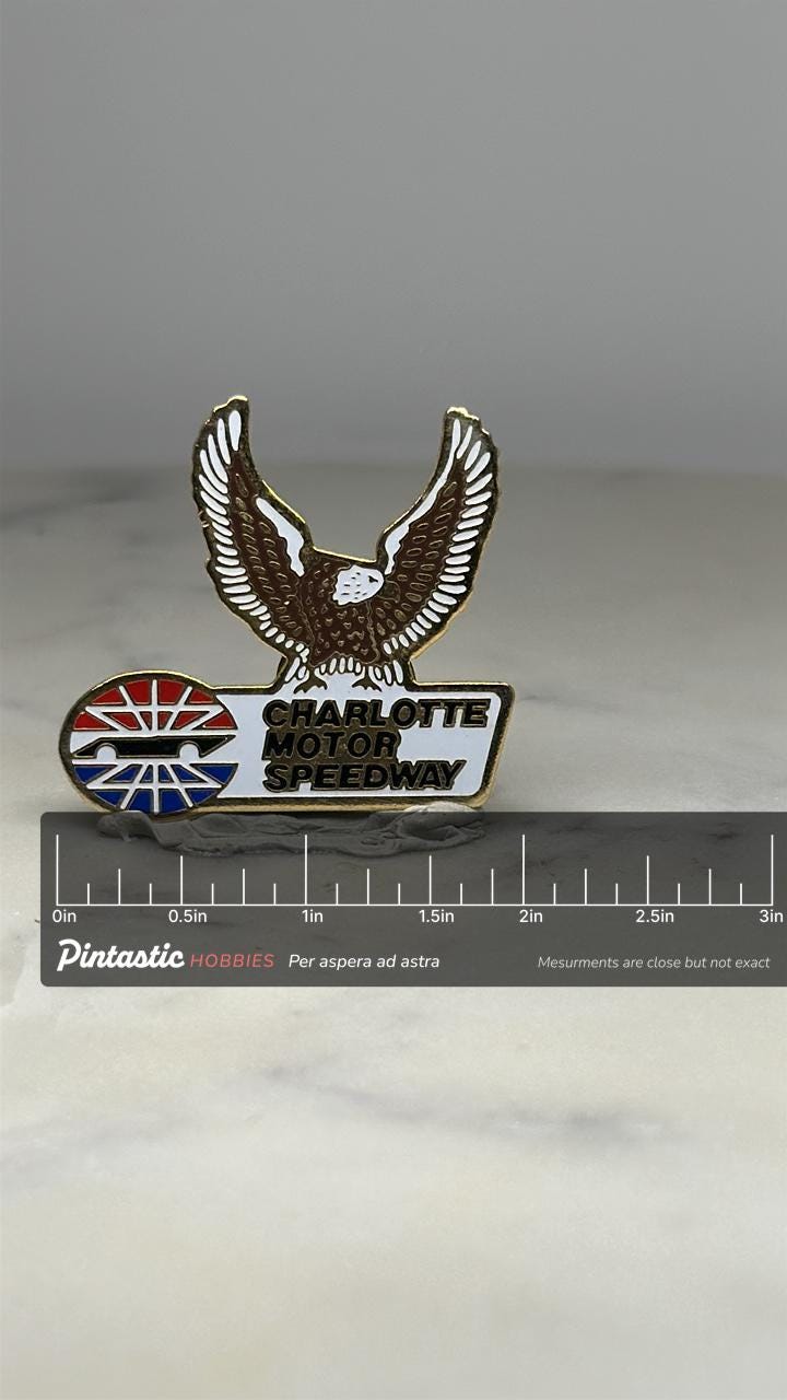 Charlotte Motor Speedway Pin: Bald Eagle Enamel - Vintage Racing Accessory with ruler overlay for size reference