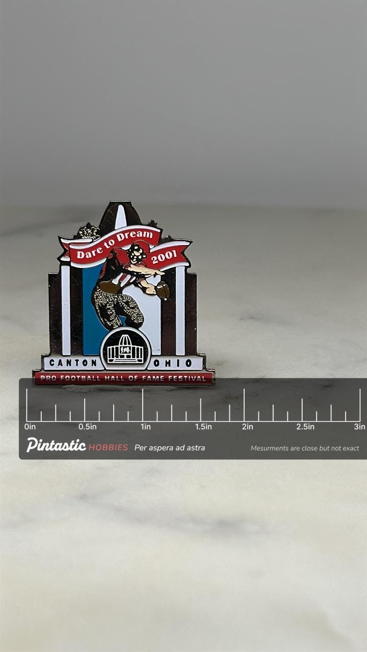 Pro Football Hall of Fame Festival Pin: Enamel Red/Black - 2001 Sports Accessory with ruler overlay for size reference