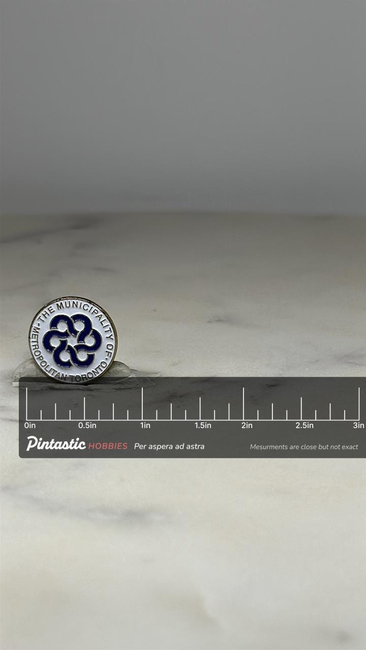 Toronto Municipality Lapel Pin: Blue & Silver Enamel - Vintage Civic Accessory with ruler overlay for size reference