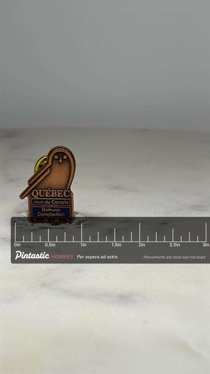 Québec Jeux du Canada Pin: Bronze Finish - 2003 Sports Accessory with ruler overlay for size reference