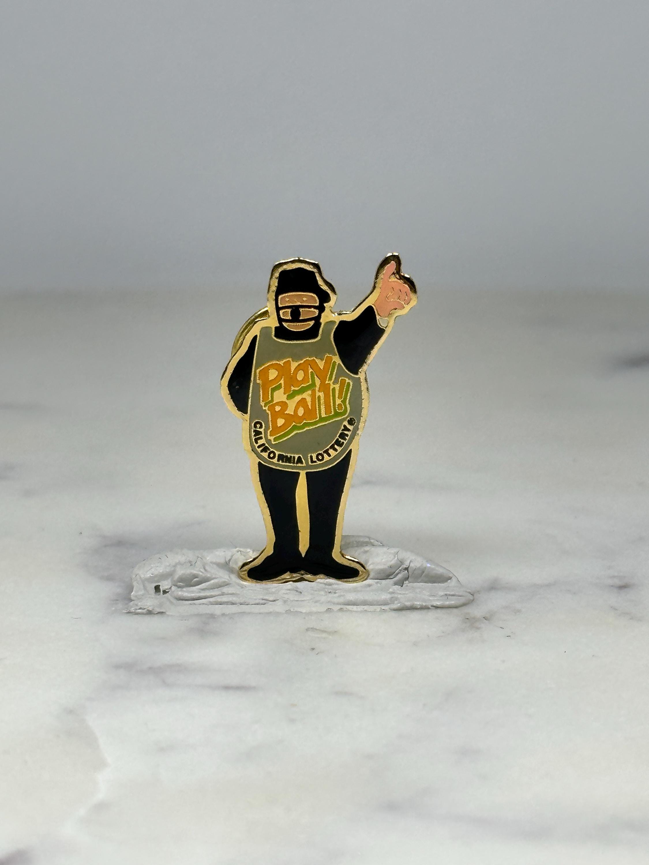 Play Ball Umpire Pin: Black Gold Enamel - California Lottery Accessory