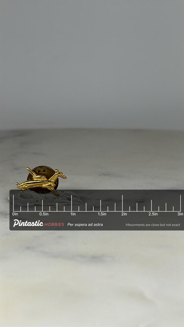 Airplane Lapel Pin: Gold Tone Jet Plane - Vintage Travel Accessory with ruler overlay for size reference
