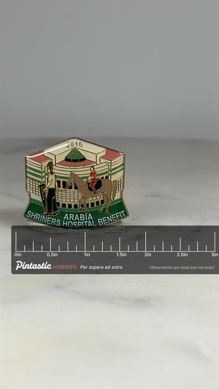 Shriners Hospital Benefit Pin: Enamel Colorful Design - 2016 Charity Accessory with ruler overlay for size reference