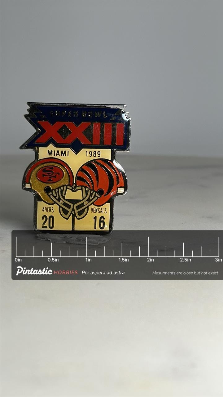 Super bowl xxiii football pin: enamel helmet design - 1989 sports accessory with ruler overlay for size reference