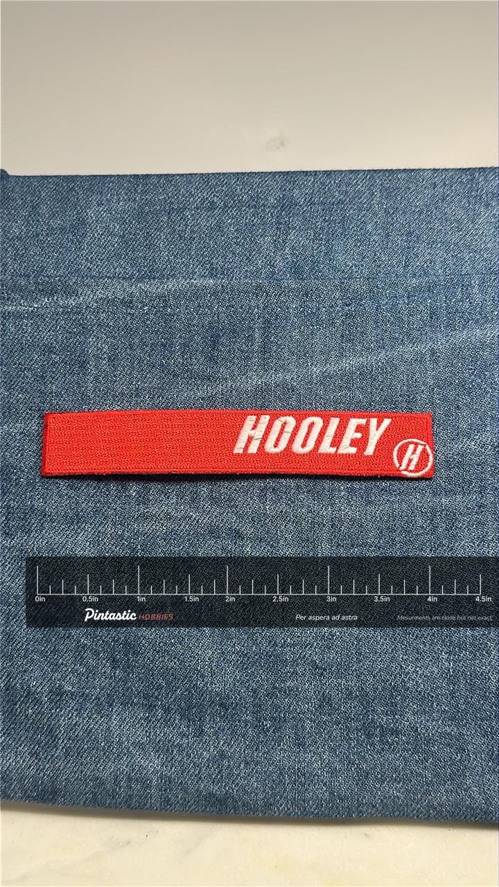Hooley Collectable Patch: Red & White Label Style - Retro Accessory with ruler overlay for size reference