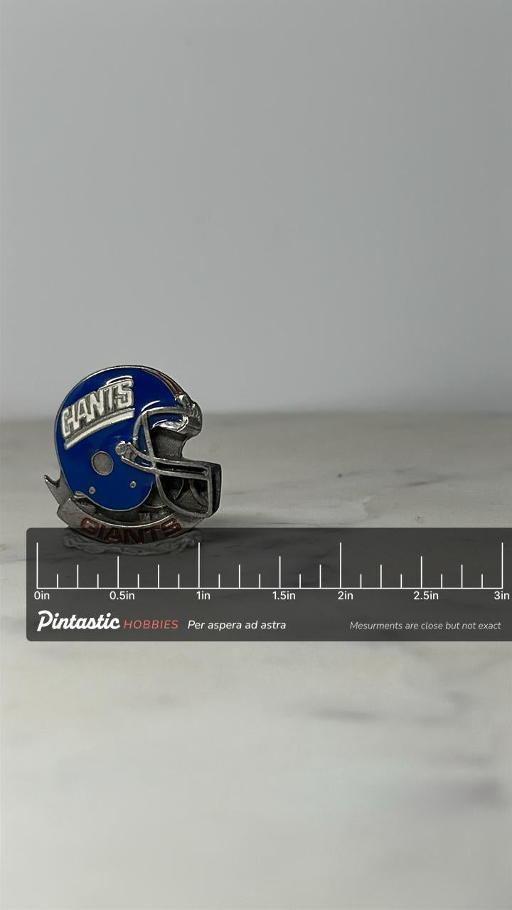New york giants helmet pin: blue & silver enamel - vintage nfl accessory with ruler overlay for size reference