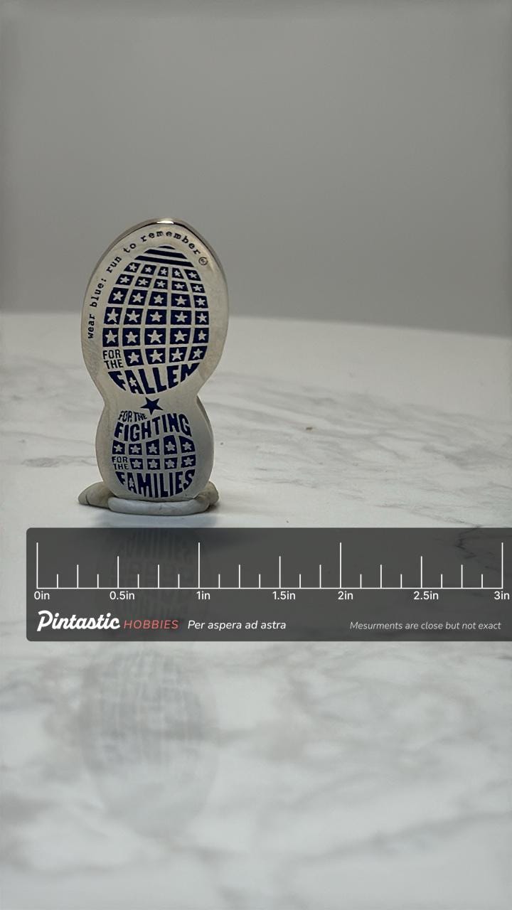 Wear Blue Memorial Pin: Blue Footprint Design - Military Tribute Accessory with ruler overlay for size reference