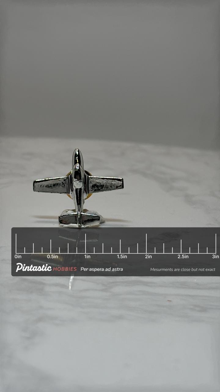 Airplane Lapel Pin: Silver Tone Metal - Aviation Collectible Accessory with ruler overlay for size reference
