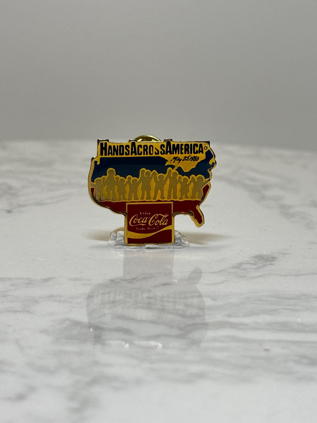 Hands Across America Pin: Red Yellow Enamel - 1986 Coca-Cola Accessory