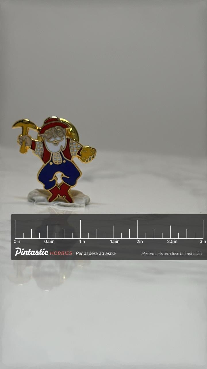 Miner Character Pin: Gold-Tone Enamel - Vintage Style Accessory with ruler overlay for size reference