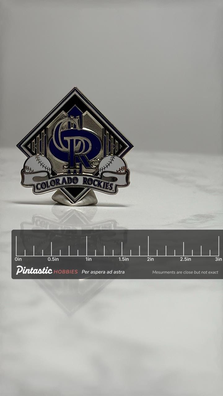 Colorado Rockies Baseball Pin: Silver & Purple Enamel - MLB Fan Accessory with ruler overlay for size reference