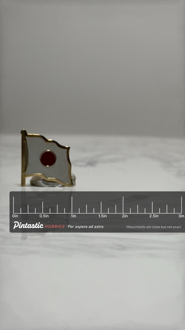 Japan Flag Lapel Pin: Gold Trim Enamel - Vintage Travel Accessory with ruler overlay for size reference