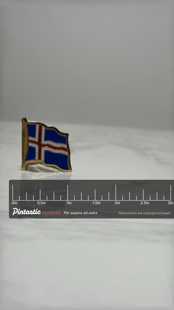 Iceland Flag Lapel Pin: Gold Trim Enamel - Travel Souvenir Accessory with ruler overlay for size reference