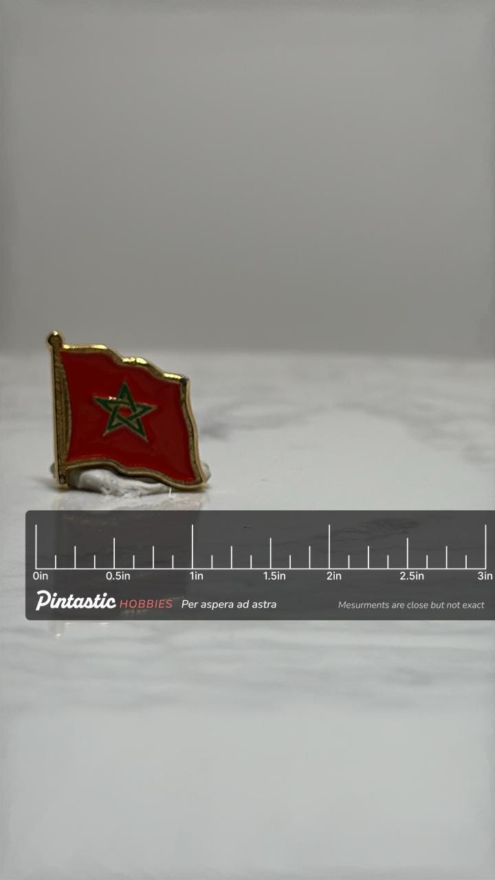 Morocco Flag Lapel Pin: Red Enamel Gold Trim - Travel Souvenir Accessory with ruler overlay for size reference