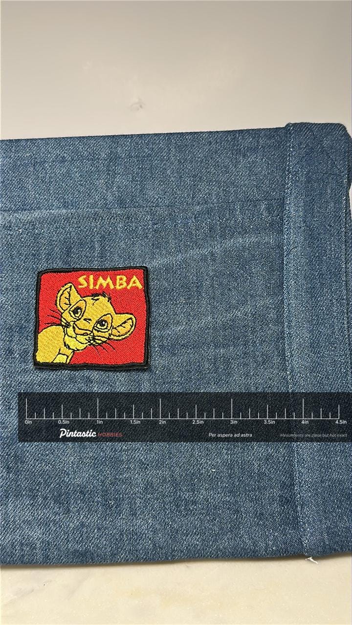 Simba Collectable Patch: Bright Cartoon Style - 1990s Animation Accessory with ruler overlay for size reference