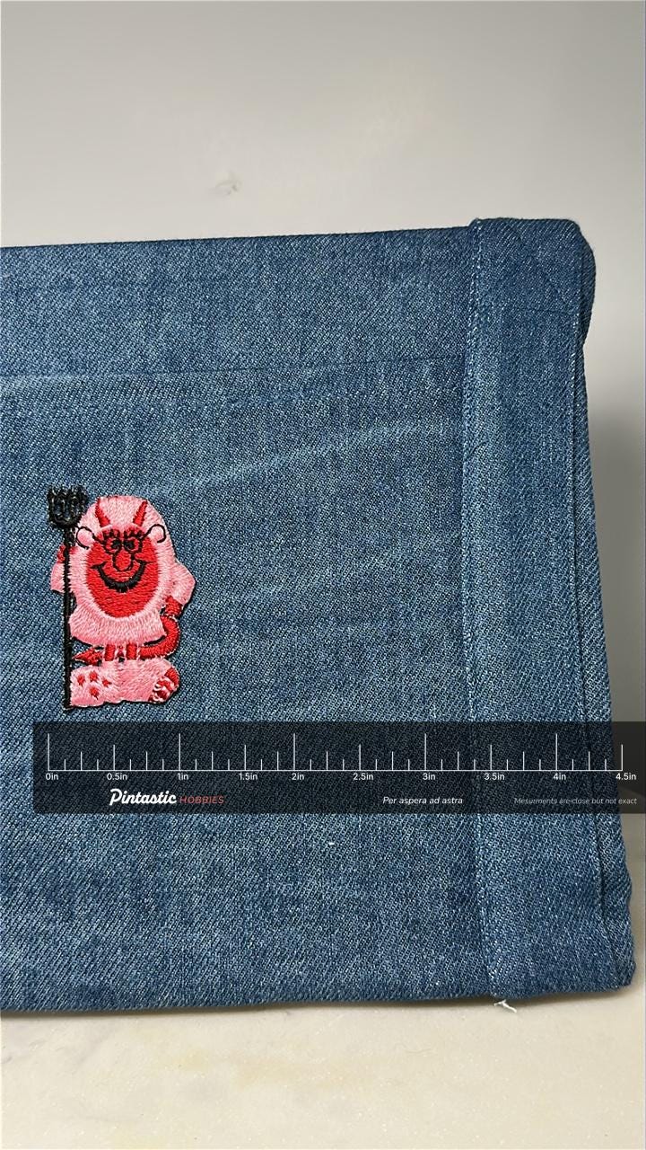 Devil Cartoon Collectable Patch: Red Pink Black - Retro Novelty Accessory with ruler overlay for size reference