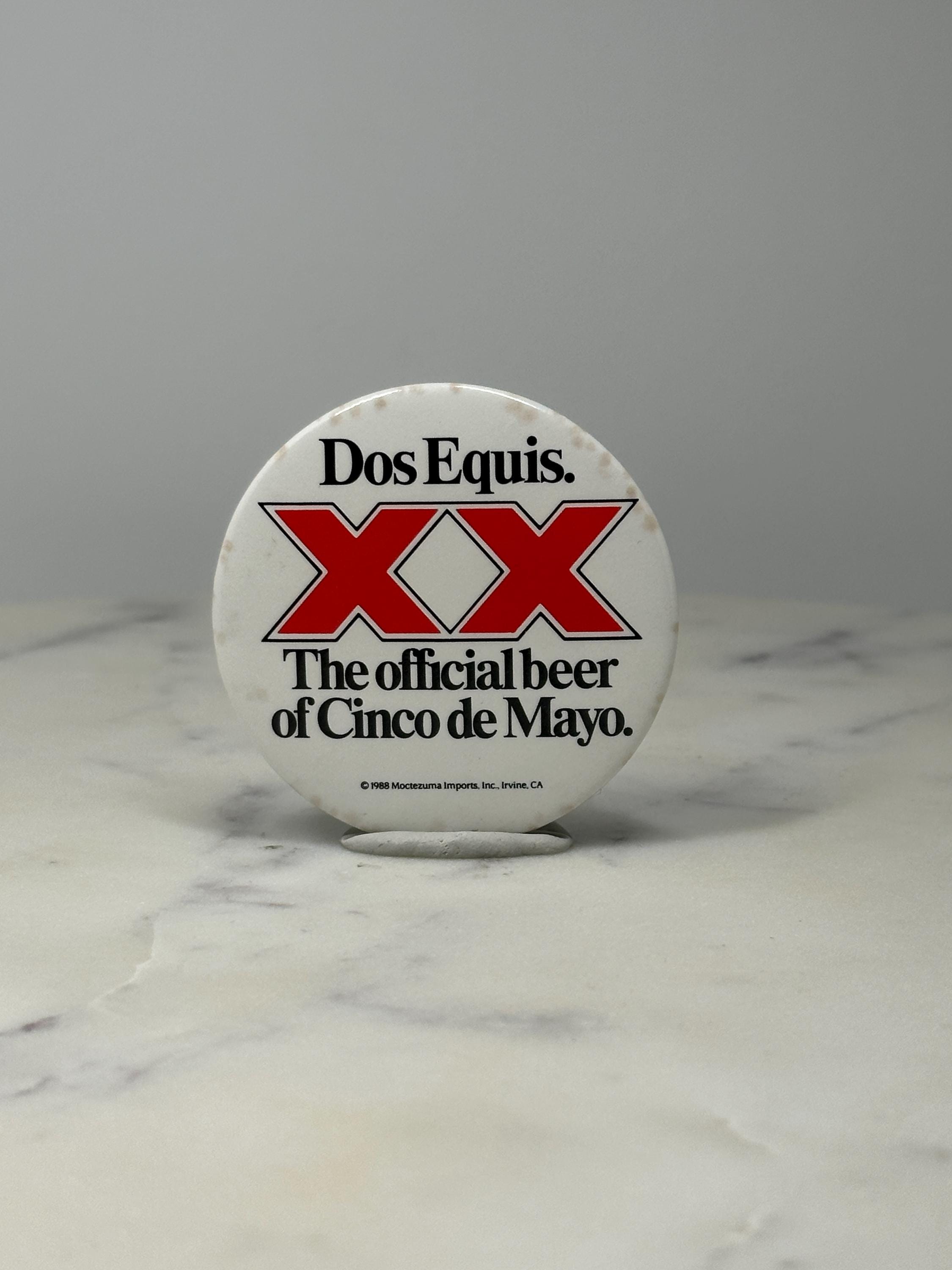 Dos Equis Beer Button Pin: Red XX Logo - 1988 Cinco de Mayo Promo