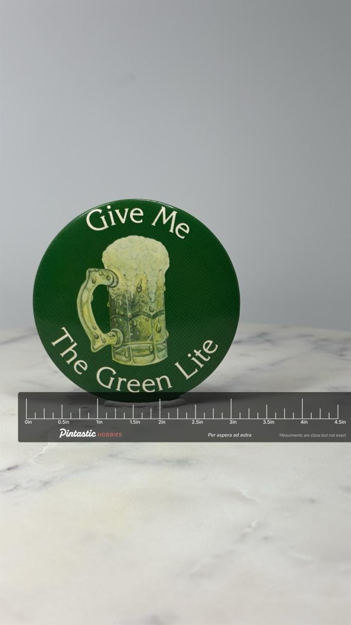 Green Beer Button Pin: Glossy Shamrock Theme - St Patricks Accessory with ruler overlay for size reference